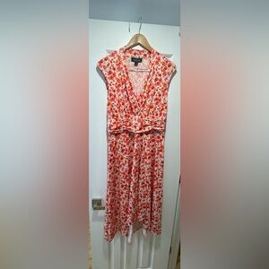 New with tags ! Coral v-neck dress w/ graduating front hemline size Medium
